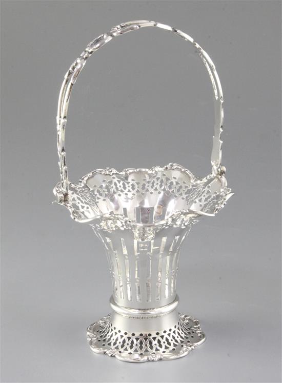 A George V silver swing handled trumpet shaped basket, Height 235mm weight 6.6oz/207grms